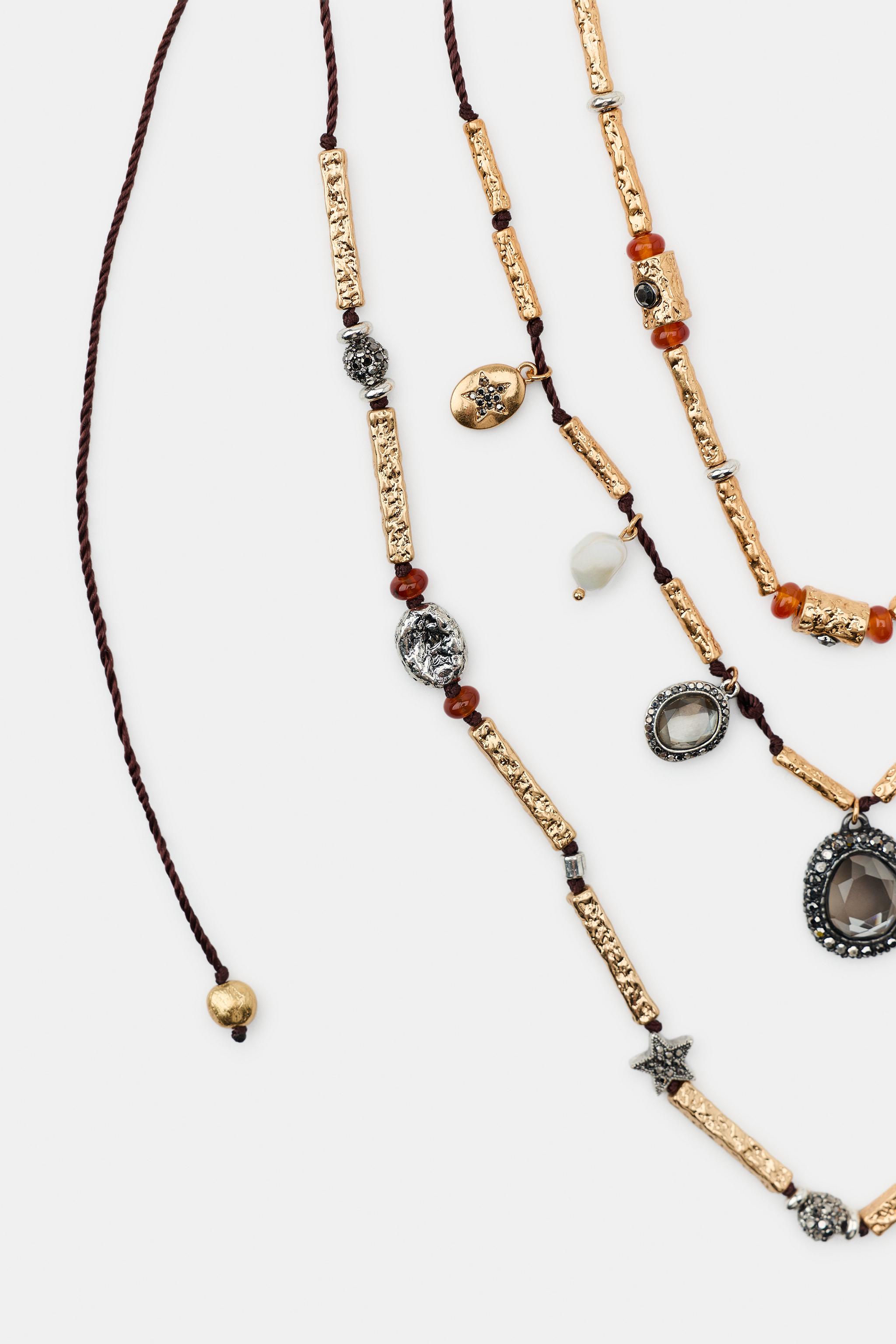 PACK OF 3 CORD NECKLACES WITH CHARMS AND JEWELS